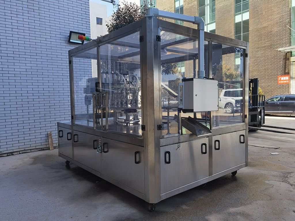 1765004582981630.jpg LG-620 斜嘴袋灌裝旋蓋機(jī)(小).jpg